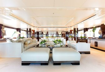 The bright white furnishings which make up the main salon of superyacht Lioness V