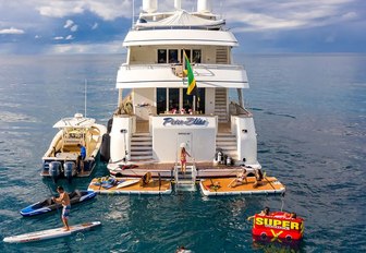 swim platform on superyacht with toys in the water