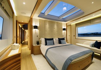 skylight looks over the bed in the master suite of motor yacht SOLIS 