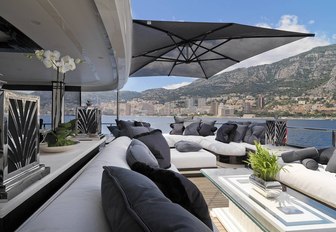 Cushioned seating on exterior of bridge deck of charter yacht silver angel