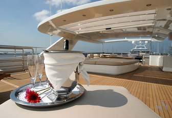 champagne is served on the sundeck of charter yacht TATIANA 