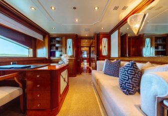 Charter yacht NEXT CHAPTER private study with desk and sofa