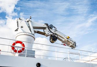 crane on the deck of charter yacht Game Changer