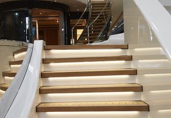 An illuminated staircase fitted to superyacht HASNA