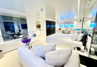 Charter yacht VERTIGO master cabin with white decor