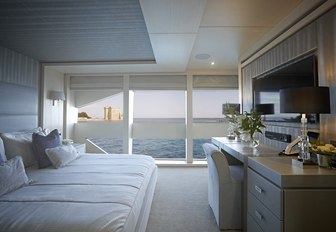 VIP suite with full-length windows on board luxury yacht ARADOS