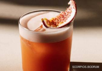 Orange cocktail with fruit