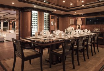 formal dining table set for dinner party aboard charter yacht MEAMINA 