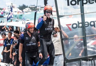 Emirates Team New Zealand climb ashore after winning the 35th America's Cup match