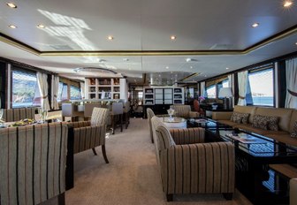 laid-back skylounge with seating area and bar aboard motor yacht DIANE 