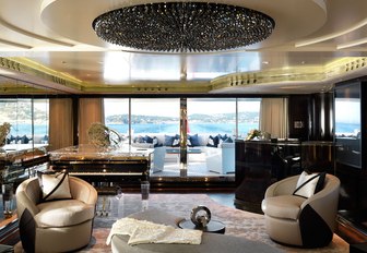 main salon and luxury chandelier on superyacht sealyon