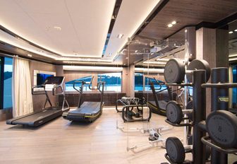 The gymnasium on board superyacht O'PTASIA