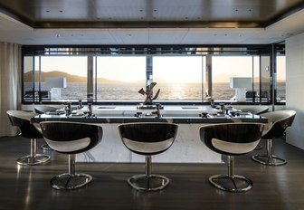 sushi table on luxury yacht Grace E where guests can watch the chef at work