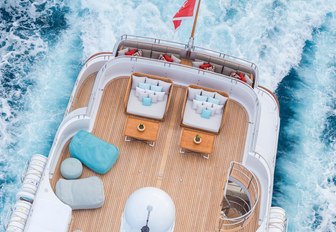 lounging areas on aft section of sundeck aboard motor yacht HANIKON when underway