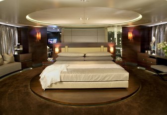 rotating bed in master suite aboard charter yacht INCEPTION 