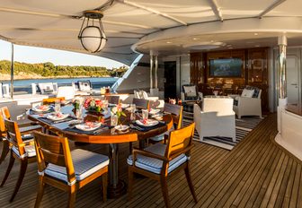 alfresco dining on the main deck aft of luxury yacht ‘Blue Moon’ 