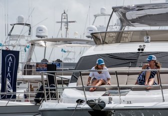 show attendees step aboard a superyacht at the Palm Beach Boat Show 2017