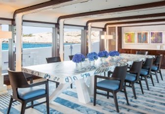 Dining table on luxury yacht MADSUMMER