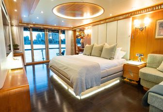Charter yacht SERENITY guest cabin with central berth