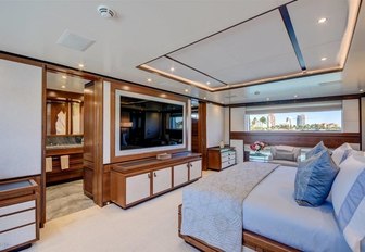 full-beam master suite with huge TV aboard superyacht Drew 