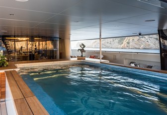 A shot which shows the large swimming pool full of water on board luxury yacht 'Here Comes The Sun'