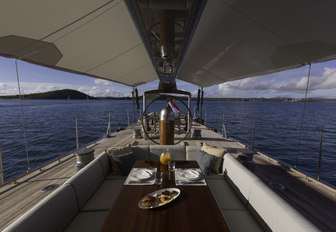 dining table in the cockpit of charter yacht RAINBOW 