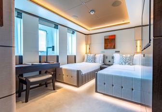 Twin cabin and large windows onboard charter yacht MOSKITO