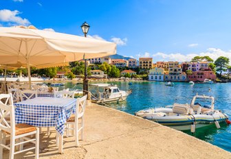 restaurant on the scenic harbour of Assos village in Kefalonia, Greece