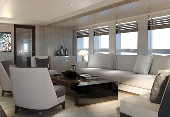 Comfortable seating with windows and blinds in background on superyacht MOSKITO