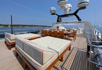 sun loungers and dining table on the sundeck of superyacht JAGUAR 