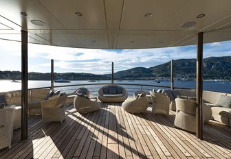 Selection of comfortable chairs on deck of Superyacht CHAKRA