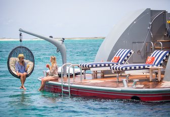 The swim platform and attached hammock seating on board M/Y Zoom Zoom Zoom