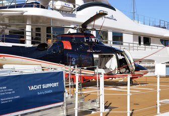 helicopter on the helipad of superyacht Power Play at the Monaco Yacht Show 2018