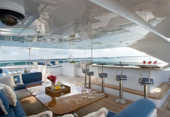 bar and seating area on the sundeck of charter yacht Lady Joy