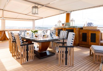 stylish alfresco dining area aboard superyacht TALITHA 