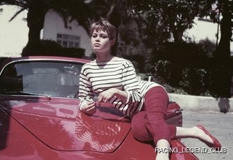 Brigitte Bardot on the bonnet of a car