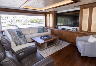 seating area and TV in the skylounge of superyacht The Rock 