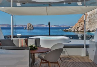 seating area and Jacuzzi beyond on the sundeck aboard luxury yacht G3