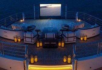 Elevated deck area and outdoor cinema screen on superyacht TIS