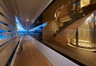 bright and airy outer deck and wide glass windows of luxury yacht JOY 