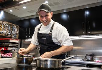 Superyacht chef in galley 