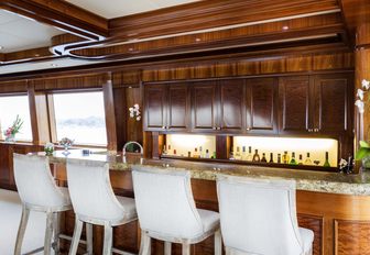 marble-topped wet bar in the skylounge of motor yacht Far From It 