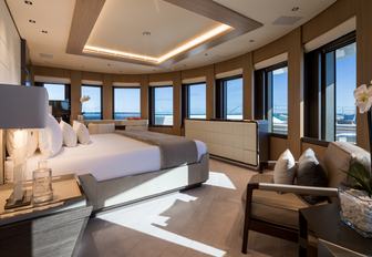 Superyacht charter ARTISAN master cabin with multiple windows