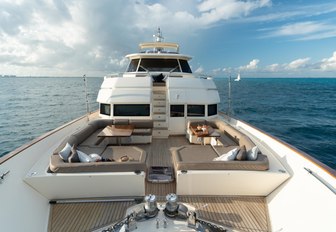 beautiful outdoor seating area on luxury charter yacht NOMADA on a sunny day 