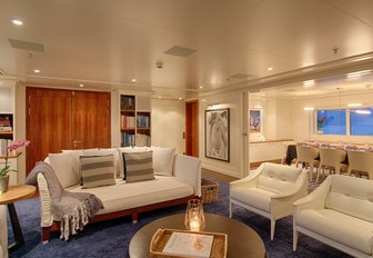 stylish main salon with lounge on board expedition yacht SENSES 