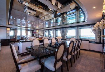 formal dining area in the main salon of charter yacht DIANE 