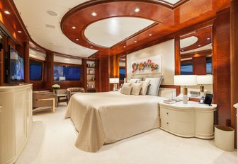 the luxurious master's quarters in charter yacht o'mega