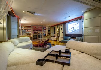 deep sofas and widescreen screen in the skylounge of superyacht ZULU 