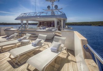 sun loungers line up on the sundeck of motor yacht KATINA 