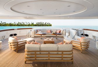 aft deck seating area with sofas and armchairs on board motor yacht CALYPSO